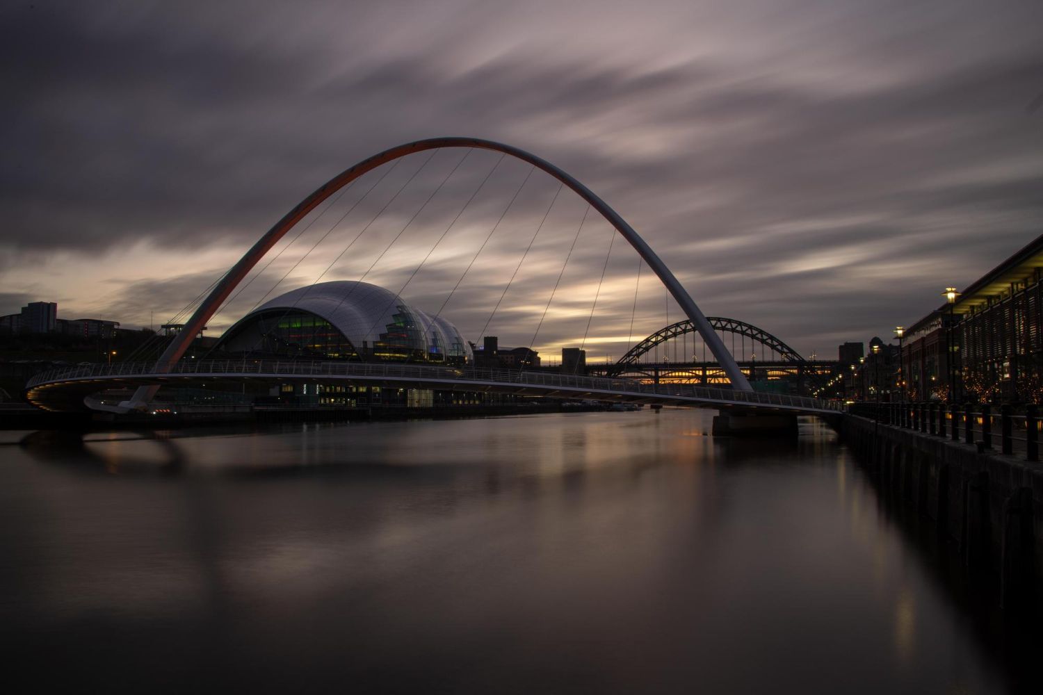 The Tyne bridges and Gateshead Millennium Bridge at dusk